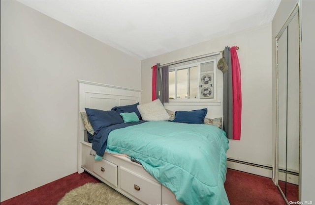 bedroom with dark colored carpet