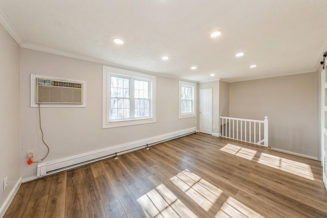 empty room featuring a baseboard radiator, recessed lighting, ornamental molding, wood finished floors, and baseboards