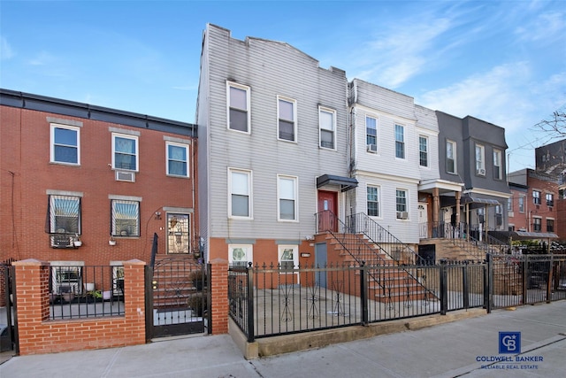 view of property with a fenced front yard