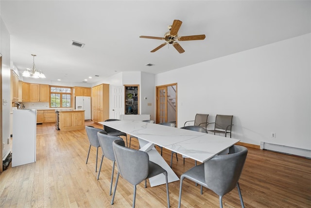 97 Ludlam Rd, Monroe, NY 10950 - dining space with a chandelier, light wood finished floors, a ceiling fan, and recessed lighting