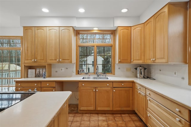 97 Ludlam Rd, Monroe, NY 10950 - kitchen with a sink, backsplash, light countertops, and recessed lighting