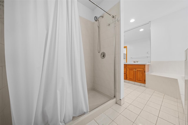 97 Ludlam Rd, Monroe, NY 10950 - full bath with a shower stall, tile patterned flooring, recessed lighting, vanity, and a bathtub