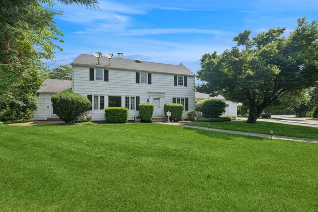 1250 Harbor Rd, Hewlett Harbor, NY 11557 - colonial home featuring a front lawn and entry steps