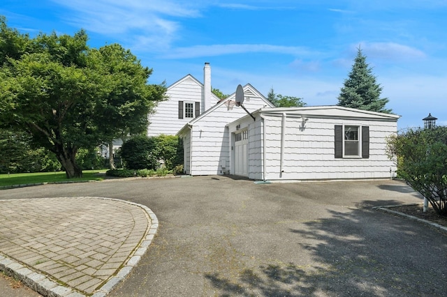 1250 Harbor Rd, Hewlett Harbor, NY 11557 - view of front of home with driveway