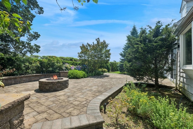 1250 Harbor Rd, Hewlett Harbor, NY 11557 - view of patio featuring a fire pit