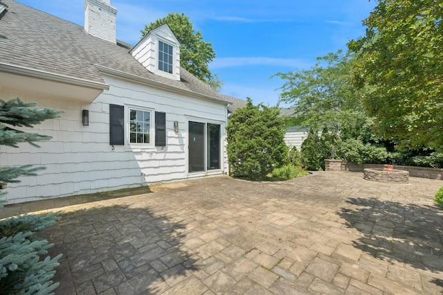 1250 Harbor Rd, Hewlett Harbor, NY 11557 - view of patio / terrace with a fire pit