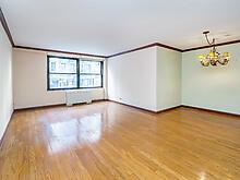 unfurnished room featuring crown molding and wood finished floors