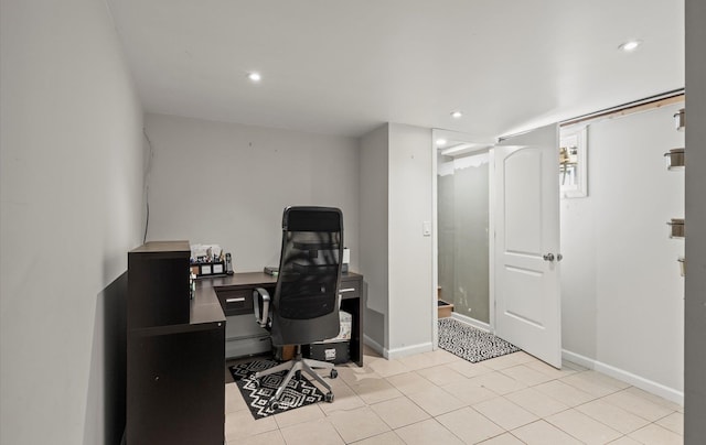 office featuring recessed lighting, tile patterned floors, baseboards, and a baseboard radiator