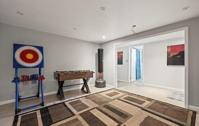 rec room featuring recessed lighting, baseboards, and tile patterned floors