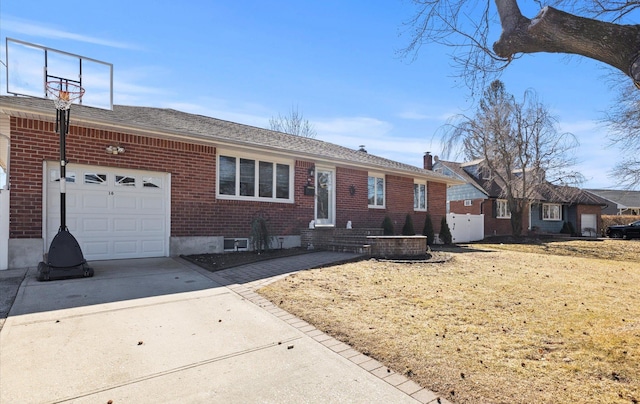 ranch-style house with concrete driveway, brick siding, and an attached garage