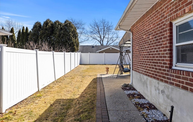 view of yard featuring a fenced backyard