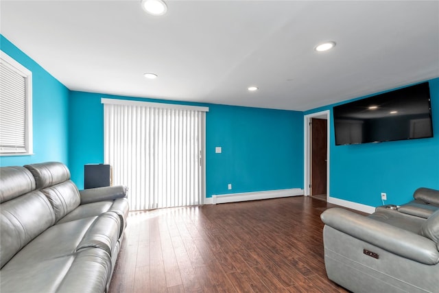 living room featuring dark wood-style floors, a baseboard radiator, baseboards, and recessed lighting