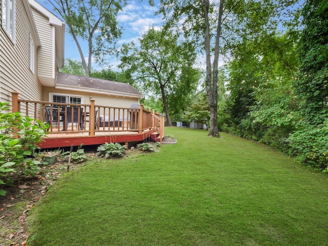 view of yard with a deck