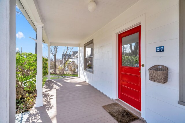 property entrance with a porch