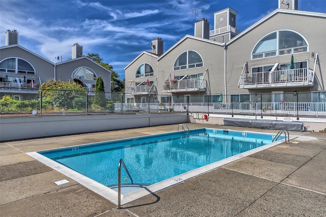 pool featuring fence