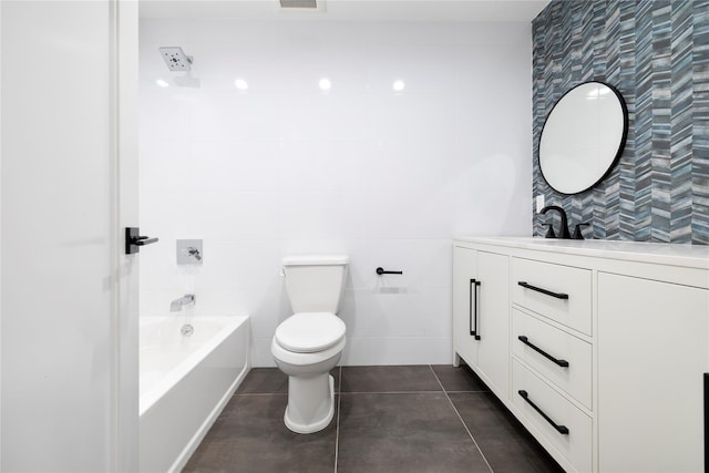 full bath featuring toilet, tile patterned flooring, a washtub, vanity, and tile walls