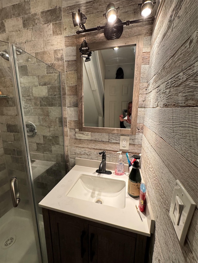 full bath featuring a shower stall and vanity