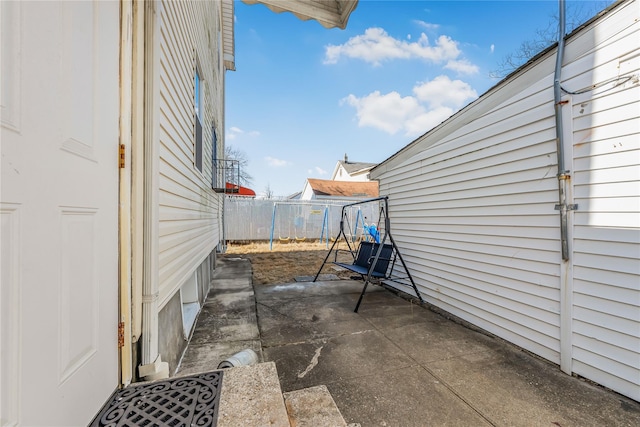 view of patio / terrace with fence