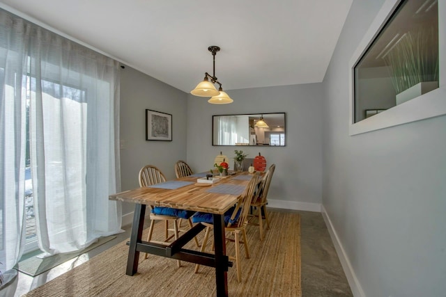 dining room with baseboards