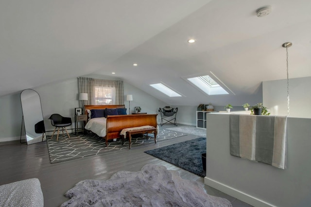 bedroom with lofted ceiling, recessed lighting, wood finished floors, and baseboards