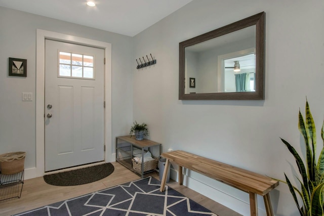 foyer featuring wood finished floors