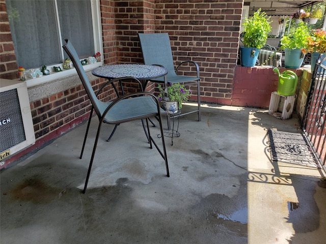 view of patio / terrace featuring heating unit