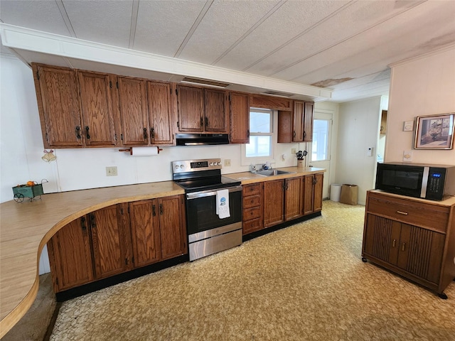 kitchen with electric stove, light floors, under cabinet range hood, black microwave, and a sink