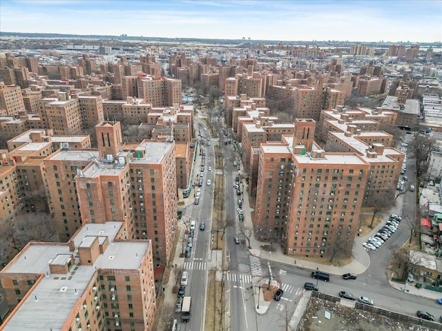 birds eye view of property with a city view