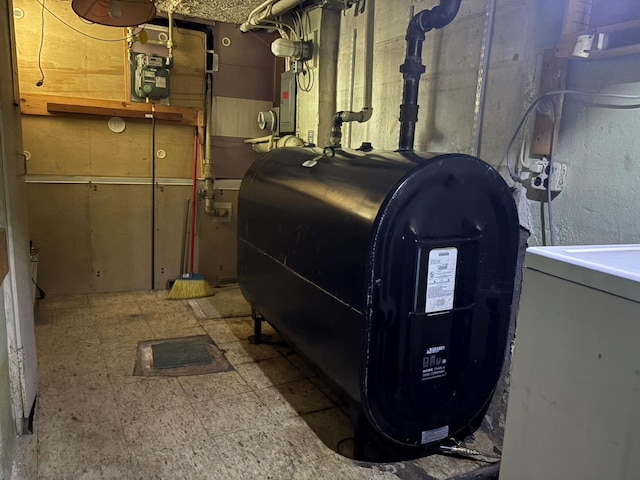 utility room featuring heating fuel