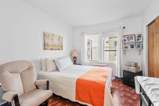 bedroom with radiator heating unit