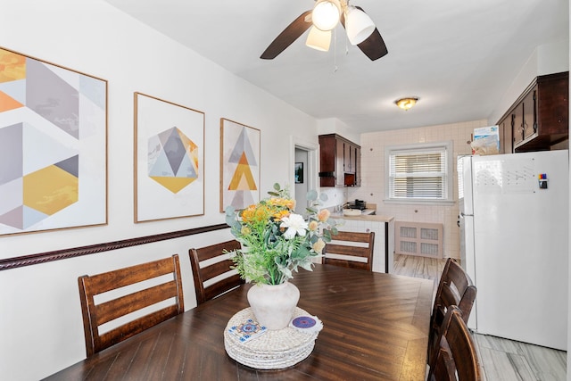 dining room featuring ceiling fan