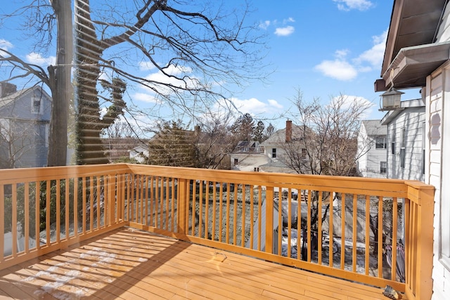 wooden deck featuring a residential view