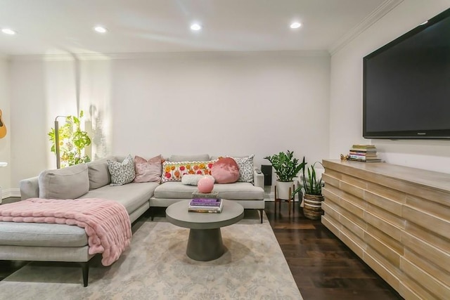 living room with ornamental molding, dark wood finished floors, and recessed lighting