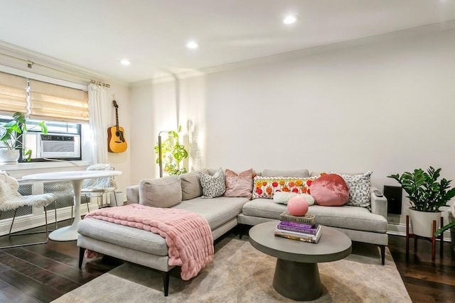 living area featuring cooling unit, recessed lighting, dark wood-style flooring, baseboards, and ornamental molding