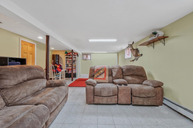 living room featuring a baseboard radiator and light tile patterned floors