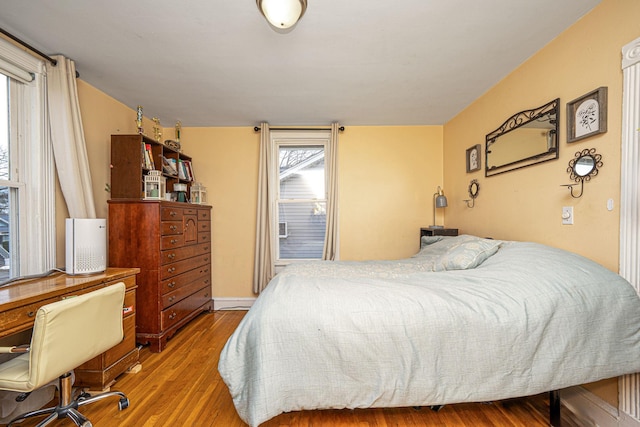 bedroom featuring wood finished floors