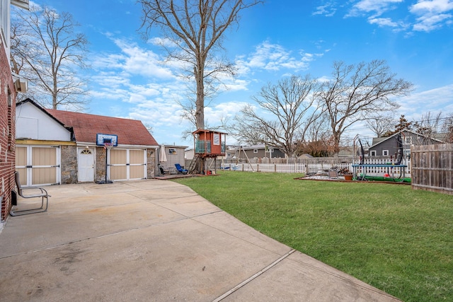 view of yard featuring a patio area and fence