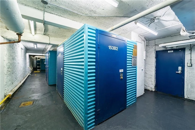 interior space featuring finished concrete floors