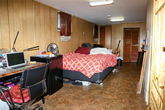 bedroom with wooden walls