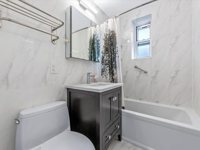 full bathroom featuring toilet, shower / tub combo, vanity, tile walls, and marble finish floor