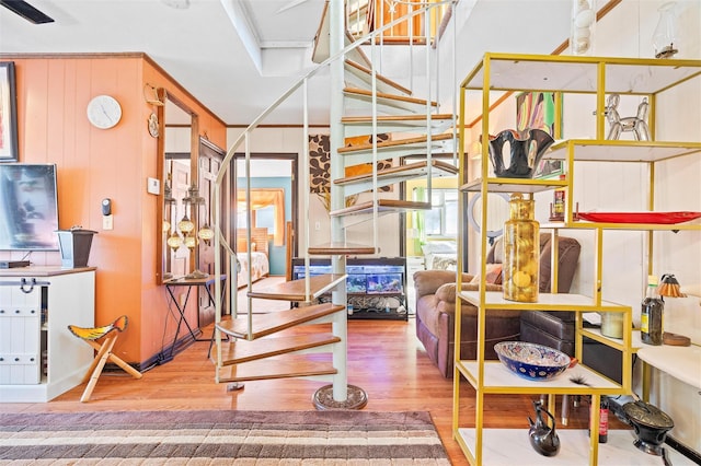 stairway with wood finished floors