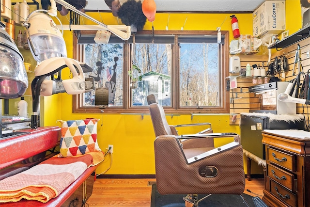 home office with light wood-style flooring