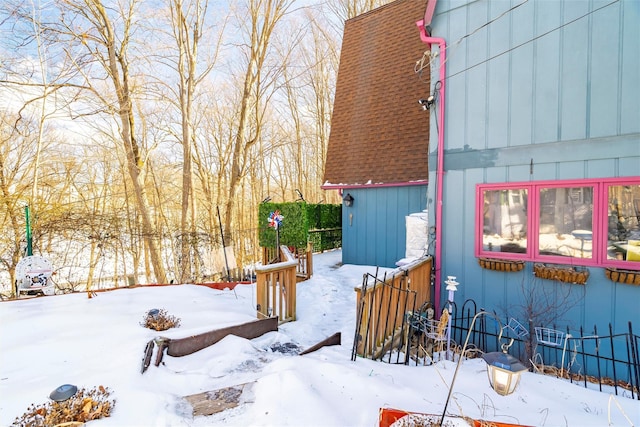 view of yard covered in snow