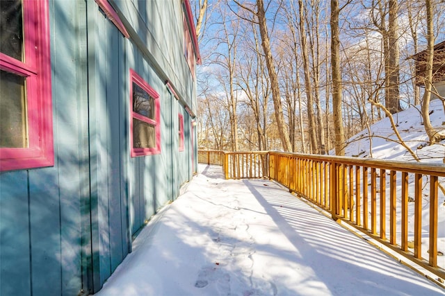 view of snow covered deck