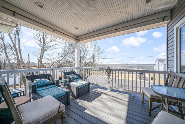 deck with an outdoor living space