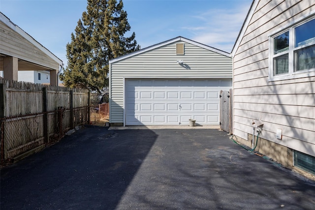 detached garage with fence