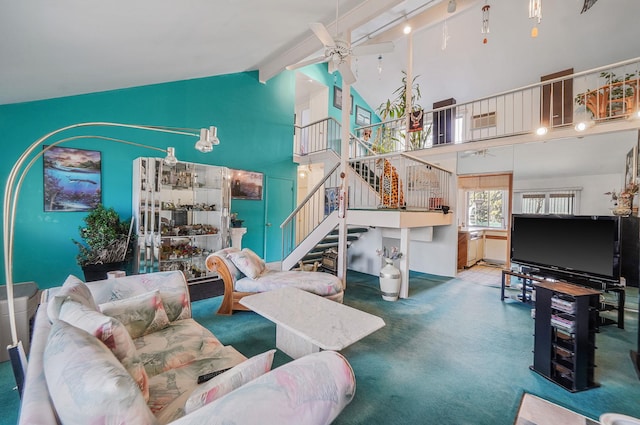 living area with a ceiling fan, stairs, carpet flooring, high vaulted ceiling, and beam ceiling