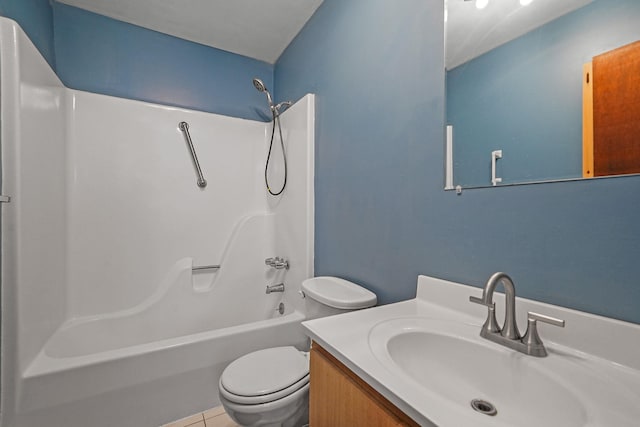 full bath featuring washtub / shower combination, tile patterned flooring, vanity, and toilet