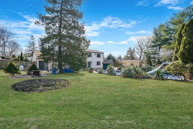 view of yard featuring fence