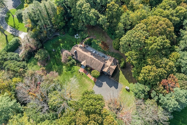 drone / aerial view with a view of trees